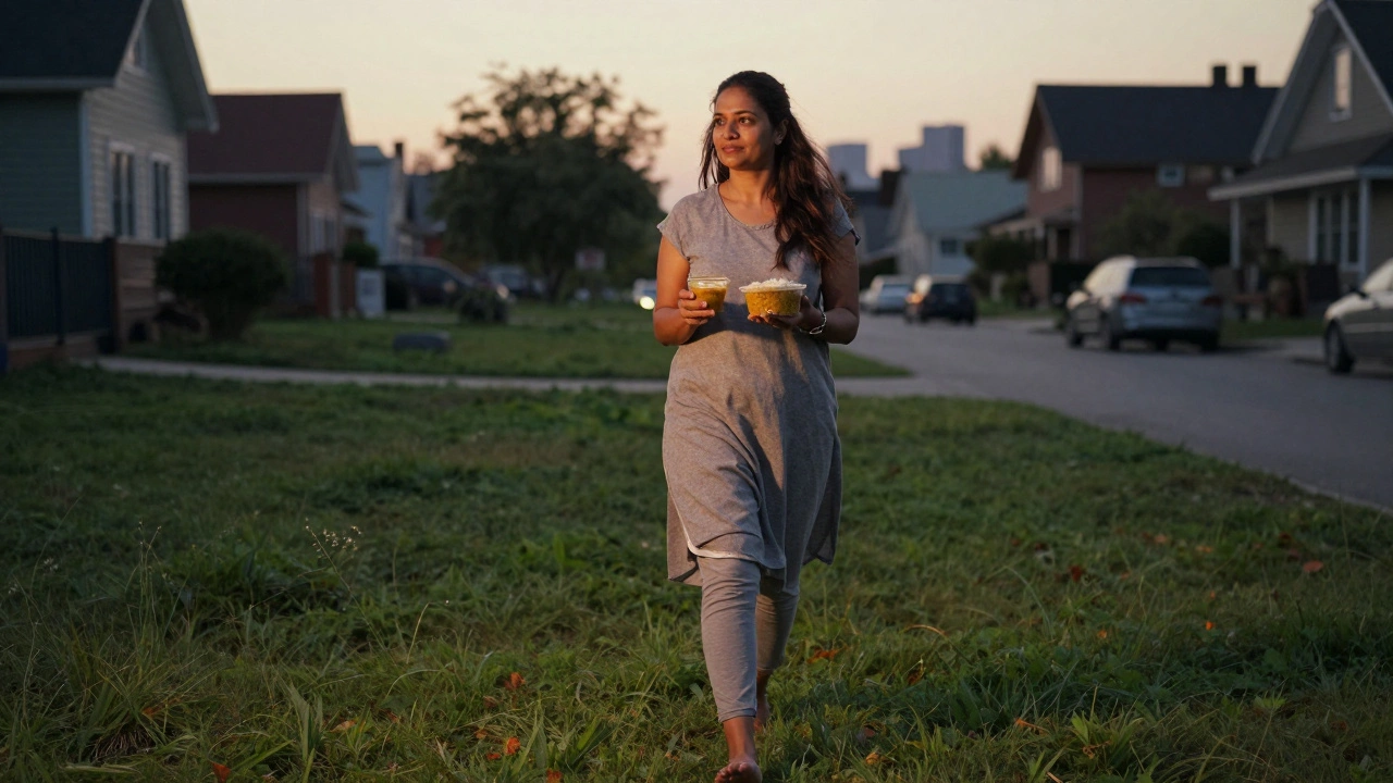 Woman walking barefoot on grass after dinner at sunset in an Indian neighborhood